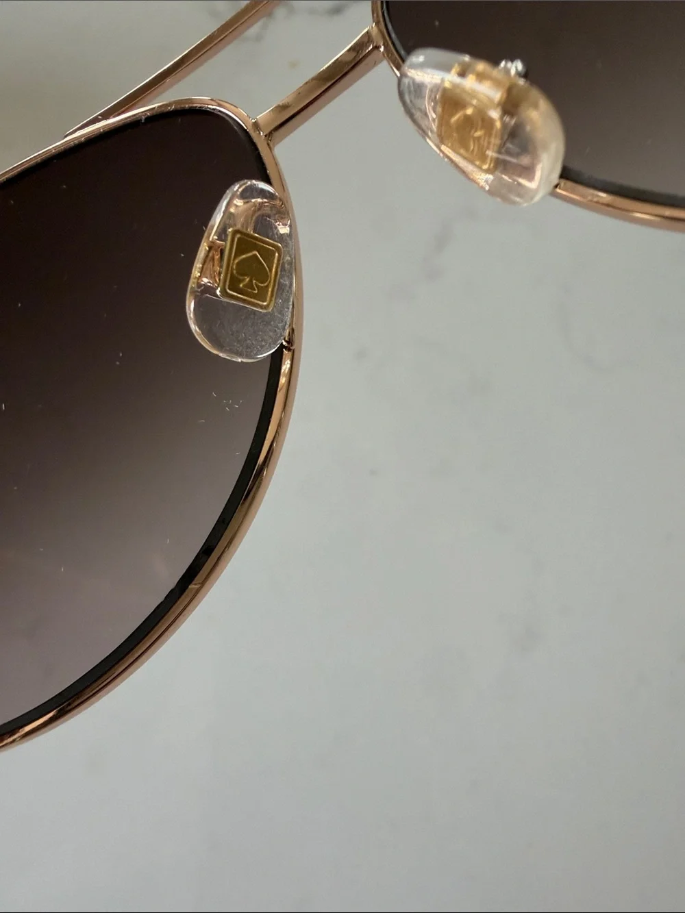 kate spade Rose Gold Frame Sunglasses with Burgundy Temples
